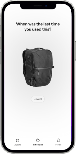 Anchor timetravel prompt asking ‘When was the last time you used this?’ above a photo of a black Aer backpack, with a Reveal button.