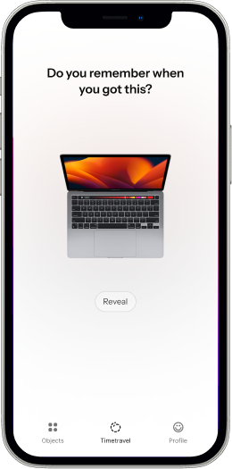 Anchor timetravel prompt asking ‘Do you remember when you got this?’ above a MacBook, with a Reveal button.