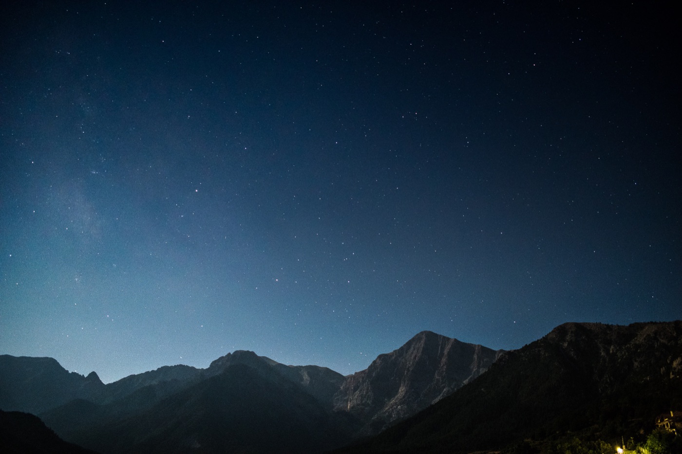 Stars beginning to appear over the ridge